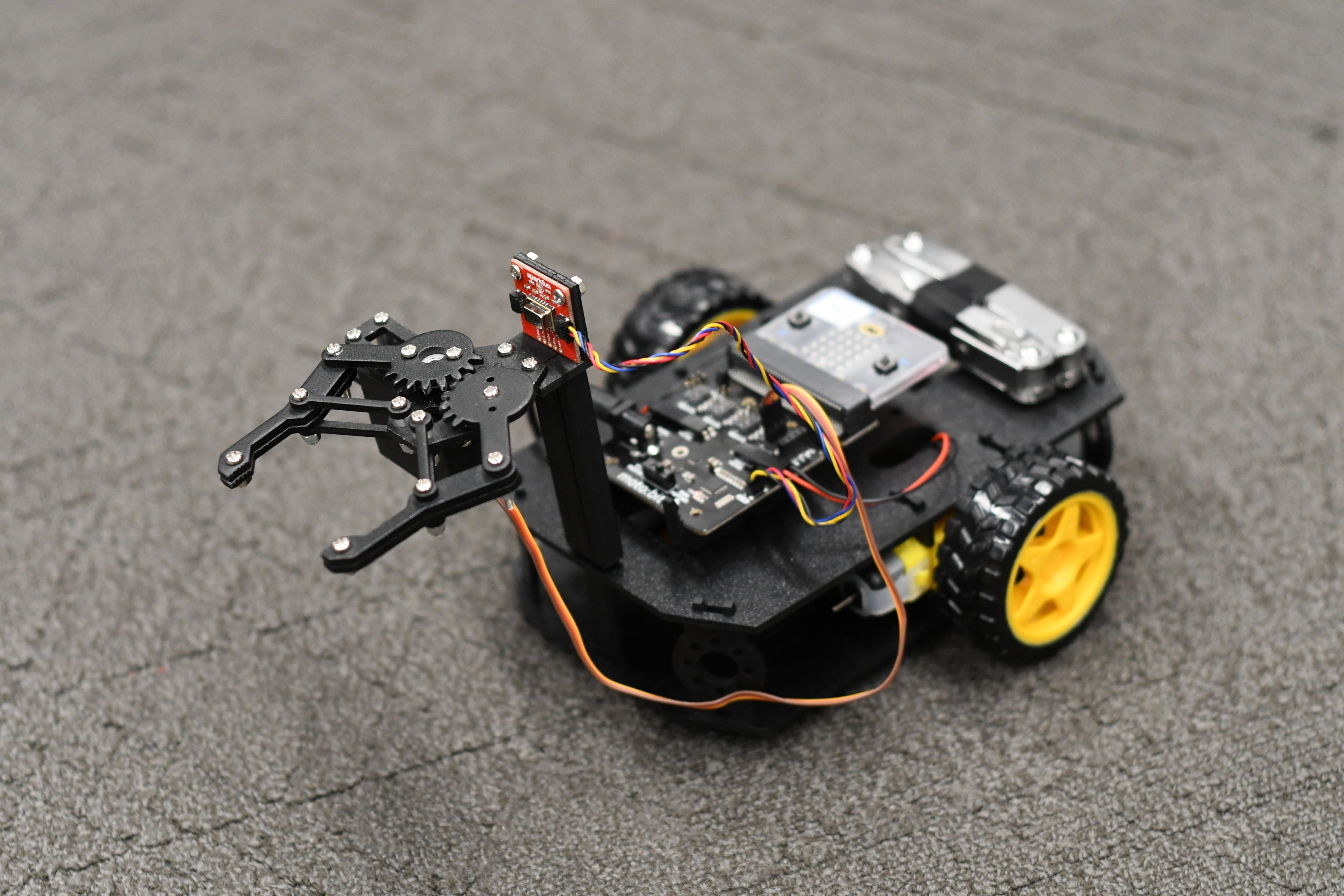 Motion Controlled Differential Drive Car with Infrared Sensor (IR) Operated Gripper